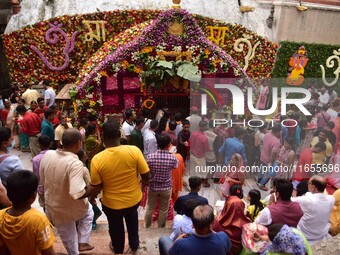 Devotees gather at the Kamakhya temple for the Hindu festival of Navratri in Guwahati, India, on October 2, 2022. (