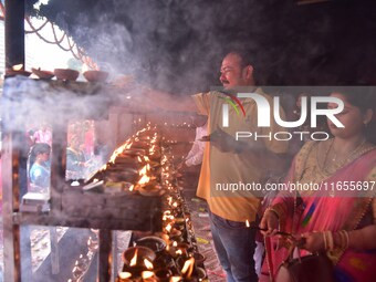 Devotees offer prayer at the Kamakhya temple for the Hindu festival of Navratri in Guwahati, India, on October 2, 2022. (