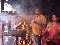 Devotees offer prayer at the Kamakhya temple for the Hindu festival of Navratri in Guwahati, India, on October 2, 2022. (