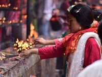 Devotees offer prayer at the Kamakhya temple for the Hindu festival of Navratri in Guwahati, India, on October 2, 2022. (