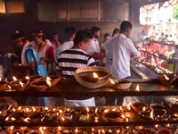 Devotees offer prayer at the Kamakhya temple for the Hindu festival of Navratri in Guwahati, India, on October 2, 2022. (