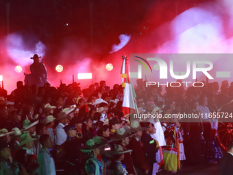 Participants perform a show during the ceremony commemorating the 200th anniversary of the Mexican Republic in Mexico City, Mexico, on Octob...