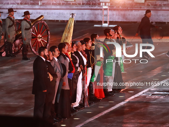 Participants perform a show during the ceremony commemorating the 200th anniversary of the Mexican Republic in Mexico City, Mexico, on Octob...