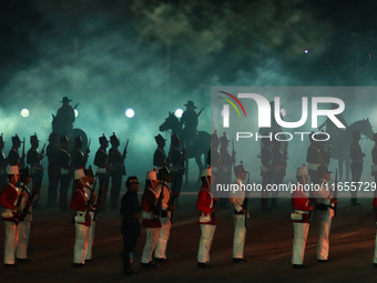 Participants perform a show during the ceremony commemorating the 200th anniversary of the Mexican Republic in Mexico City, Mexico, on Octob...