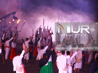 Participants perform a show during the ceremony commemorating the 200th anniversary of the Mexican Republic in Mexico City, Mexico, on Octob...