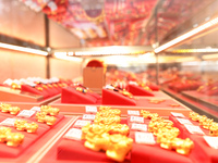 Gold ornaments are pictured at a gold shop in Renhuai, China, on October 11, 2024. (