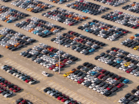 Vehicles parked at an automobile manufacturer are about to be shipped to the market in Ningde, China, on October 10, 2024. (