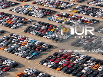 Vehicles parked at an automobile manufacturer are about to be shipped to the market in Ningde, China, on October 10, 2024. (