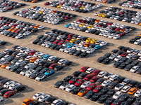 Vehicles parked at an automobile manufacturer are about to be shipped to the market in Ningde, China, on October 10, 2024. (