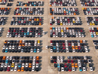 Vehicles parked at an automobile manufacturer are about to be shipped to the market in Ningde, China, on October 10, 2024. (