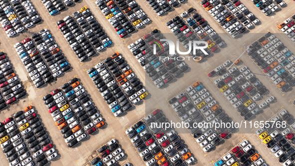 Vehicles parked at an automobile manufacturer are about to be shipped to the market in Ningde, China, on October 10, 2024. 