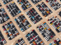 Vehicles parked at an automobile manufacturer are about to be shipped to the market in Ningde, China, on October 10, 2024. (