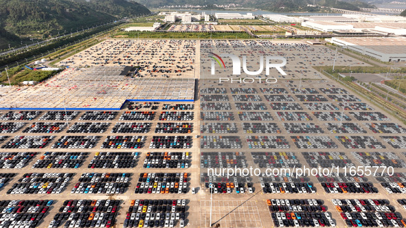 Vehicles parked at an automobile manufacturer are about to be shipped to the market in Ningde, China, on October 10, 2024. 