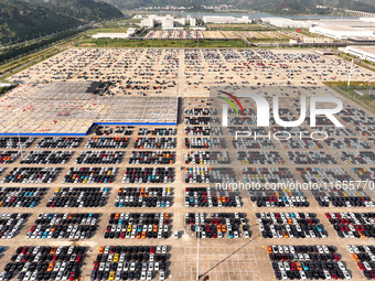 Vehicles parked at an automobile manufacturer are about to be shipped to the market in Ningde, China, on October 10, 2024. (