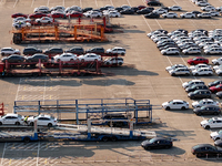 Vehicles parked at an automobile manufacturer are about to be shipped to the market in Ningde, China, on October 10, 2024. (