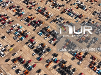 Vehicles parked at an automobile manufacturer are about to be shipped to the market in Ningde, China, on October 10, 2024. (