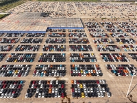 Vehicles parked at an automobile manufacturer are about to be shipped to the market in Ningde, China, on October 10, 2024. (