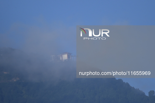 A view of the Chandragiri Cable Car in a misty morning in Kirtipur, Kathmandu, Nepal, on October 7, 2024. 