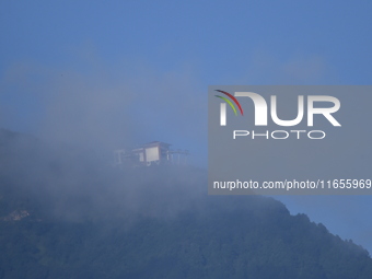 A view of the Chandragiri Cable Car in a misty morning in Kirtipur, Kathmandu, Nepal, on October 7, 2024. (