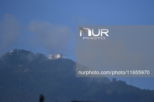 A view of the Chandragiri Cable Car in a misty morning in Kirtipur, Kathmandu, Nepal, on October 7, 2024. 