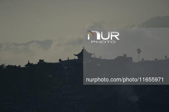 A view of Aadinath Temple in a misty morning in Kirtipur, Kathmandu, Nepal, on October 7, 2024. 