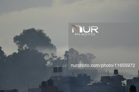 A view of Aadinath Temple in a misty morning in Kirtipur, Kathmandu, Nepal, on October 7, 2024. 