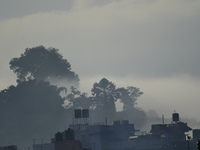 A view of Aadinath Temple in a misty morning in Kirtipur, Kathmandu, Nepal, on October 7, 2024. (