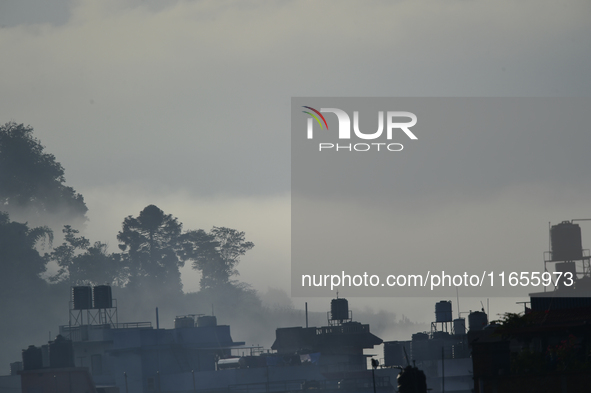 A view of Aadinath Temple in a misty morning in Kirtipur, Kathmandu, Nepal, on October 7, 2024. 