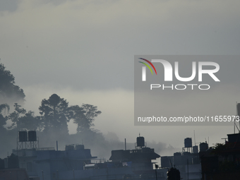 A view of Aadinath Temple in a misty morning in Kirtipur, Kathmandu, Nepal, on October 7, 2024. (