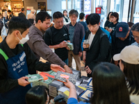 Citizens purchase books by novelist Han Kang, the 2024 Nobel Prize winner in Literature, at Kyobo Bookstore in Gwanghwamun, Jongno-gu, Seoul...