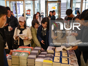 Citizens purchase books by novelist Han Kang, the 2024 Nobel Prize winner in Literature, at Kyobo Bookstore in Gwanghwamun, Jongno-gu, Seoul...