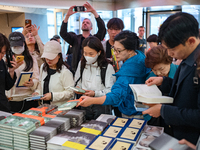 Citizens purchase books by novelist Han Kang, the 2024 Nobel Prize winner in Literature, at Kyobo Bookstore in Gwanghwamun, Jongno-gu, Seoul...