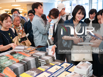 Citizens purchase books by novelist Han Kang, the 2024 Nobel Prize winner in Literature, at Kyobo Bookstore in Gwanghwamun, Jongno-gu, Seoul...