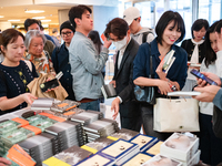 Citizens purchase books by novelist Han Kang, the 2024 Nobel Prize winner in Literature, at Kyobo Bookstore in Gwanghwamun, Jongno-gu, Seoul...