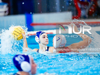 BETA Eleni of Ethnikos OFPF faces off against SIOUTI Christina of Olympiacos SFP during the Olympiacos SFP vs Ethnikos OFPF Women's Water Po...