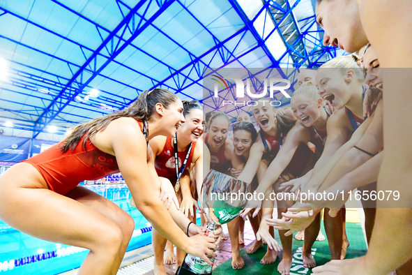 Olympiacos SFP players hold the Super Cup Trophy during the Olympiacos SFP vs Ethnikos OFPF Women's Waterpolo Super Cup 2024 Final in Athens...