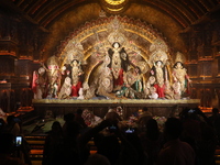 People visit a ''pandal'' or temporary platform during the Durga Puja festival in Kolkata, India, on October 11, 2024. The annual Durga Puja...