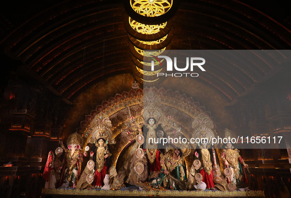 A Hindu goddess Durga is pictured inside a ''pandal'' or temporary platform during the Durga Puja festival in Kolkata, India, on October 11,...