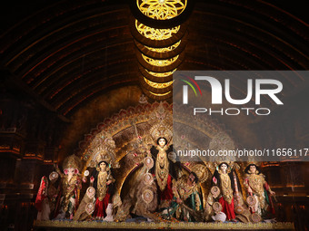 A Hindu goddess Durga is pictured inside a ''pandal'' or temporary platform during the Durga Puja festival in Kolkata, India, on October 11,...