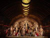 A Hindu goddess Durga is pictured inside a ''pandal'' or temporary platform during the Durga Puja festival in Kolkata, India, on October 11,...