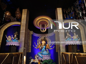 A Hindu goddess Durga is pictured inside a ''pandal'' or temporary platform during the Durga Puja festival in Kolkata, India, on October 11,...