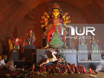 A Hindu goddess Durga is pictured inside a ''pandal'' or temporary platform during the Durga Puja festival in Kolkata, India, on October 11,...