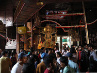 People visit a ''pandal'' or temporary platform during the Durga Puja festival in Kolkata, India, on October 11, 2024. The annual Durga Puja...