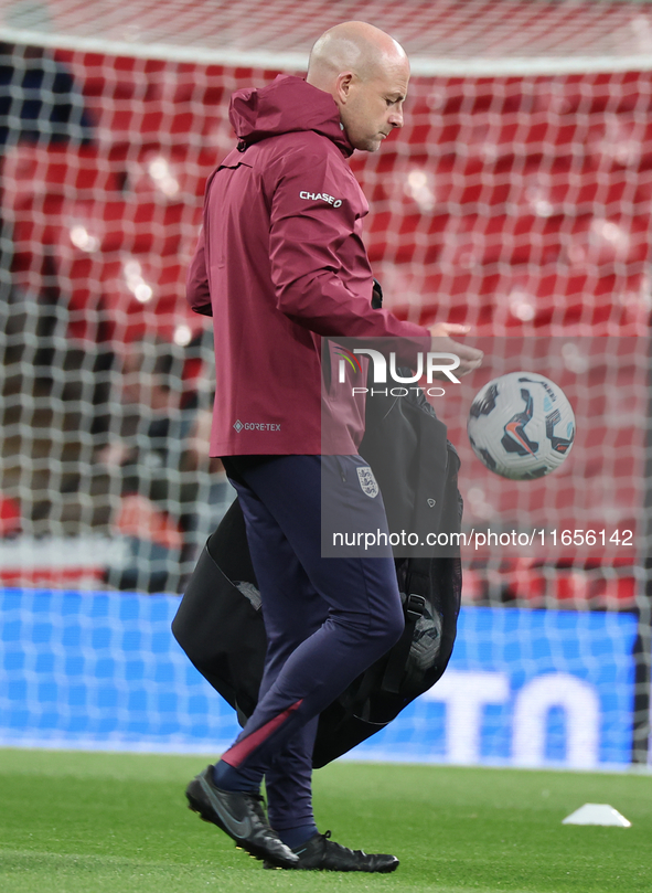 Lee Carsley, Interim Head Coach of England, participates in the pre-match warm-up during the UEFA Nations League Group 2 match between Engla...