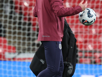 Lee Carsley, Interim Head Coach of England, participates in the pre-match warm-up during the UEFA Nations League Group 2 match between Engla...