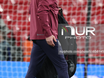 Lee Carsley, Interim Head Coach of England, participates in the pre-match warm-up during the UEFA Nations League Group 2 match between Engla...