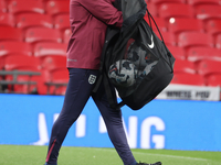 Lee Carsley, Interim Head Coach of England, participates in the pre-match warm-up during the UEFA Nations League Group 2 match between Engla...