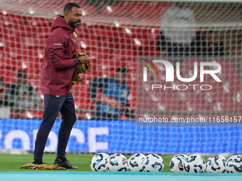 Assistant manager Ashley Cole (interim) of England participates in the pre-match warm-up during the UEFA Nations League Group 2 match betwee...