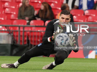 Odysseas Vlachodimos of Greece, from Newcastle United, participates in the pre-match warm-up during the UEFA Nations League Group 2 match be...