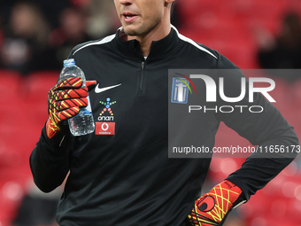 Kostas Tzolakis of Greece participates in the pre-match warm-up during the UEFA Nations League Group 2 match between England and Greece at W...